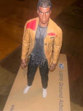 Action Figure with Tan Jacket and Red Accents - Kids Play Figure
